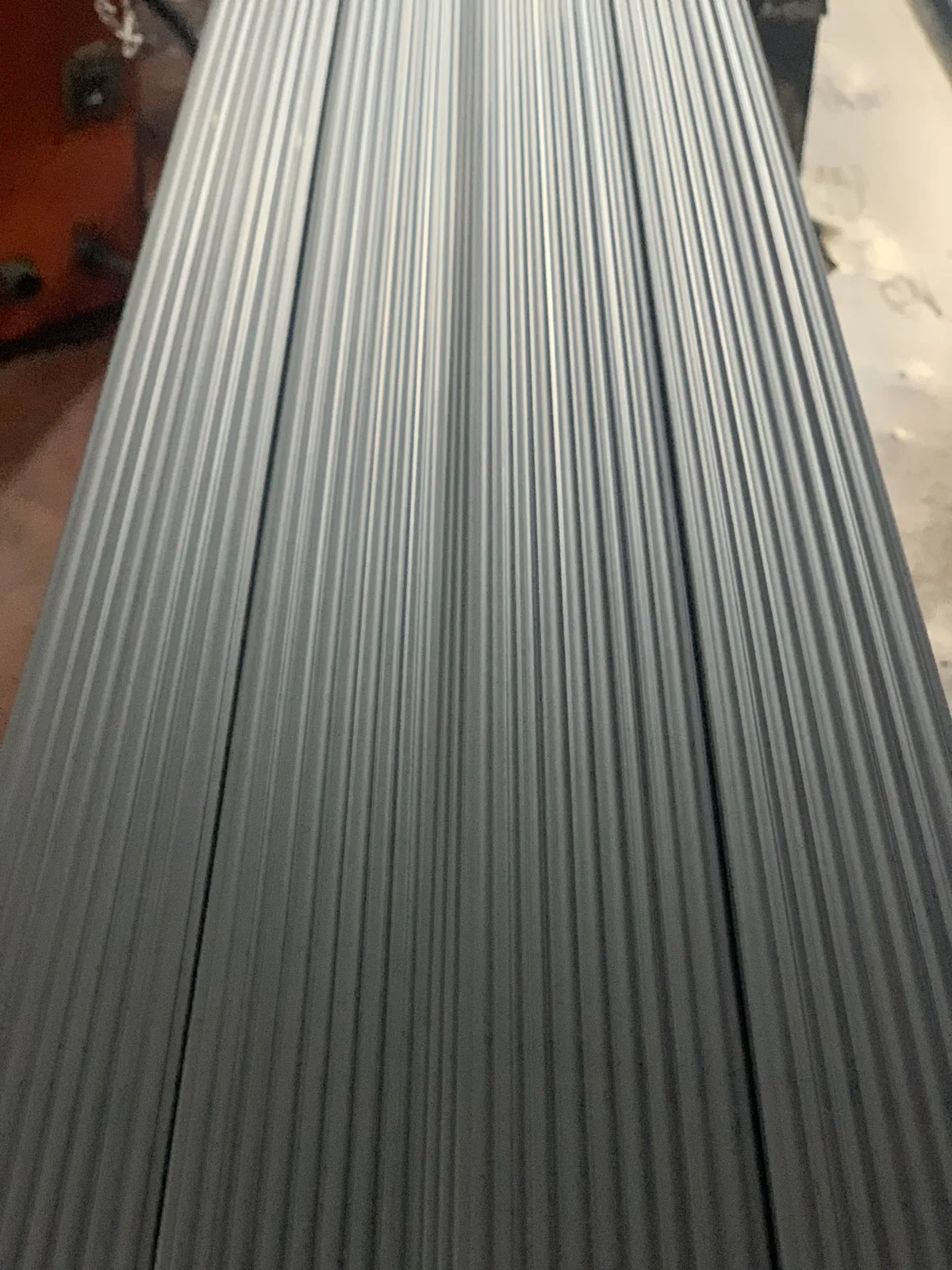 A ribbed strip coming off the extrusion line
