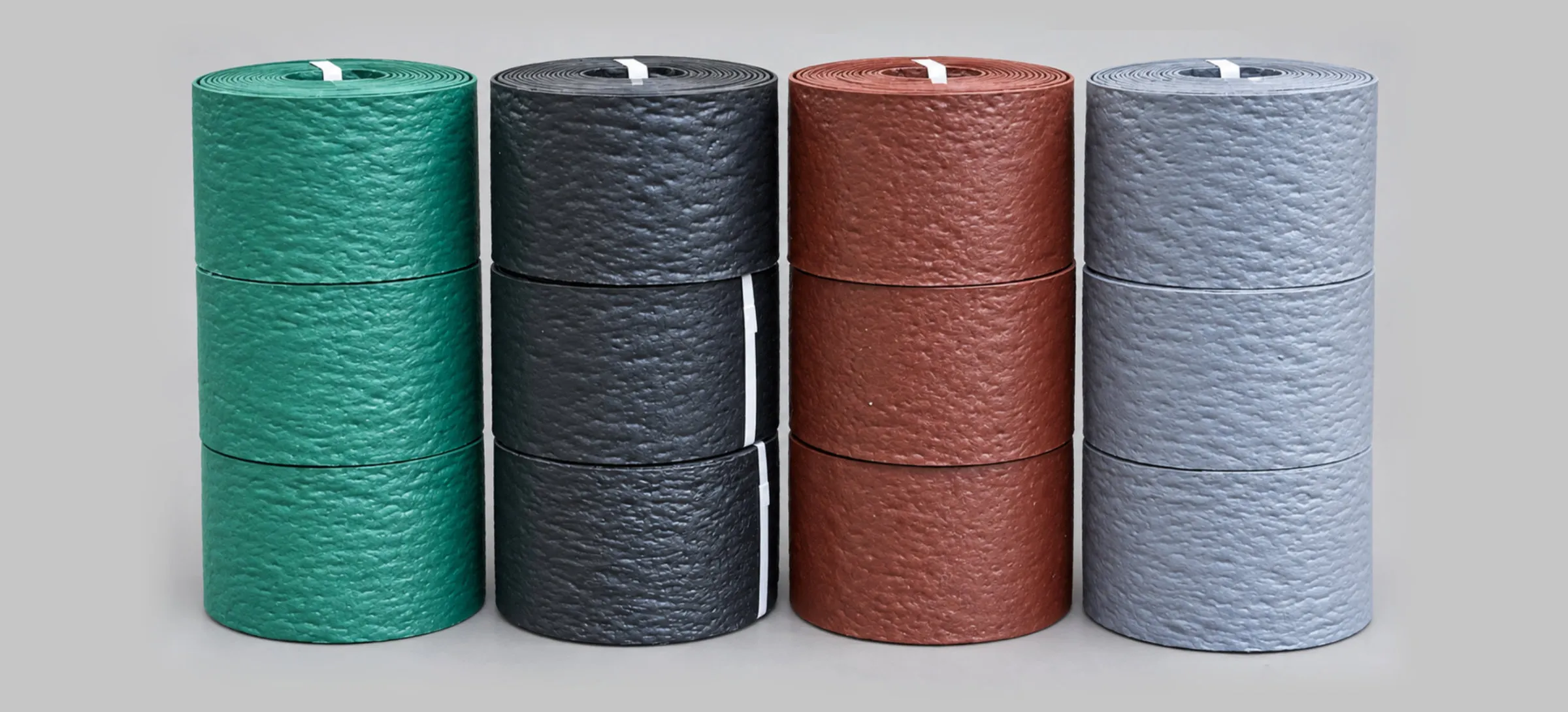 Rolls of garden edging in four colours